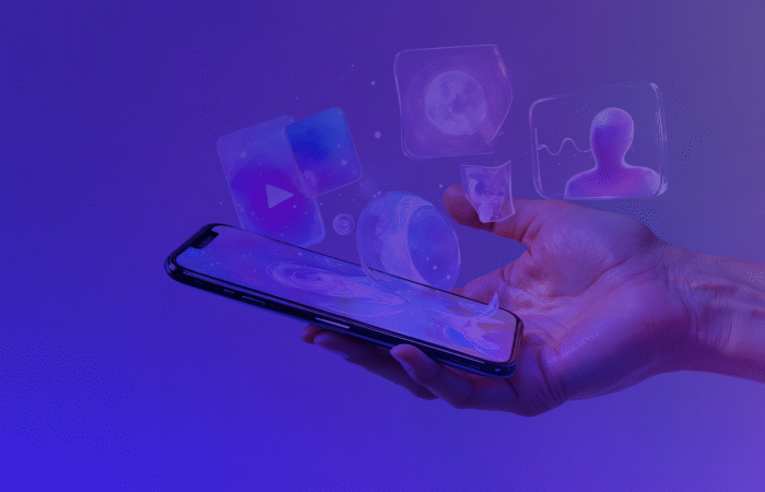 Social media and digital marketing icons from phone held in hand. Future digital marketing trends