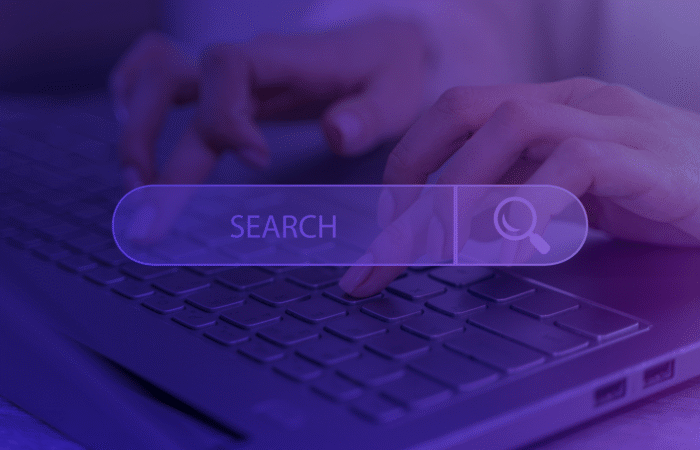 Search engine optimization strategy for 2025: Tools, examples, and best practices. Person typing on calculator in a search bar